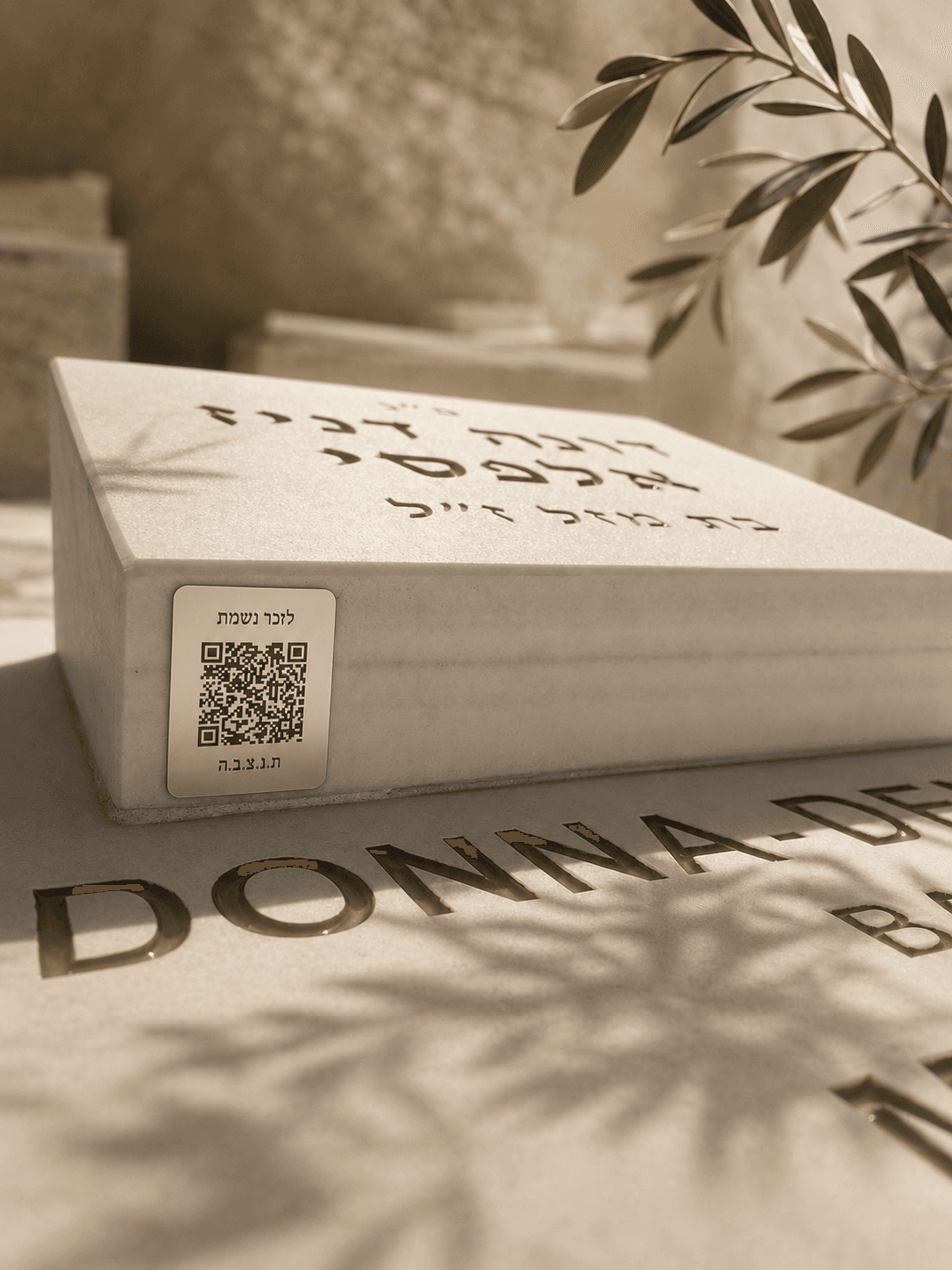 MatsevaLink marble plaque with QR code on a gravestone